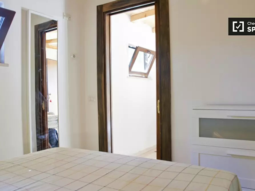 Immagine 4 di Camera condivisa in affitto  in Via dei Bonacolsi a Roma