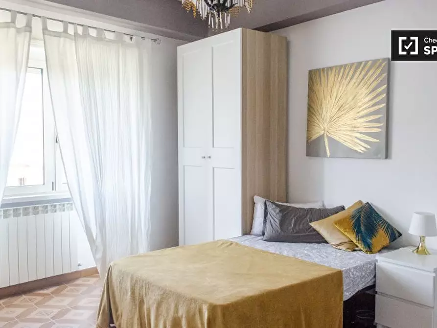 Immagine 2 di Camera condivisa in affitto  in Via Oderzo, 00182 Roma RM, Italy a Roma