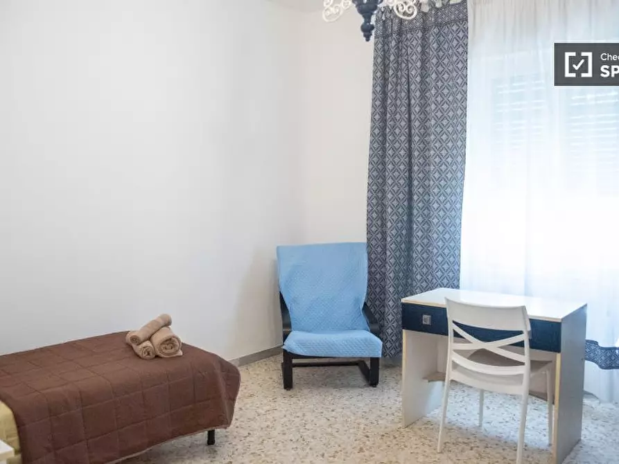 Immagine 1 di Camera condivisa in affitto  in Via Orbassano a Roma