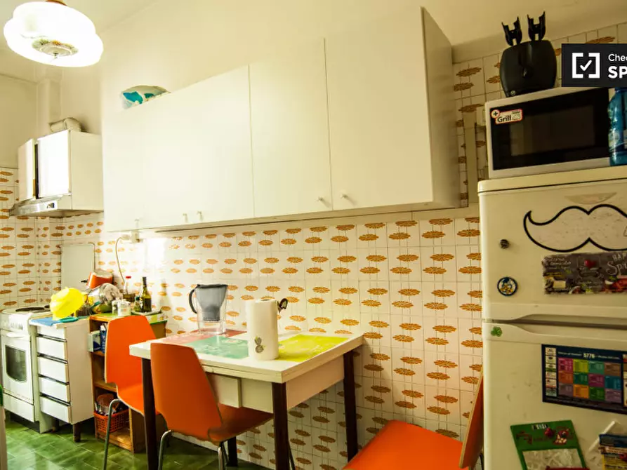 Immagine 8 di Camera condivisa in affitto  in Via Carnia a Roma