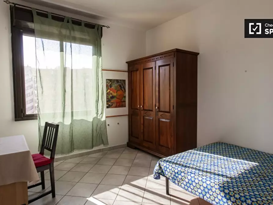 Immagine 4 di Camera condivisa in affitto  in Via Valentino Banal, 00177 Roma RM, Italy a Roma