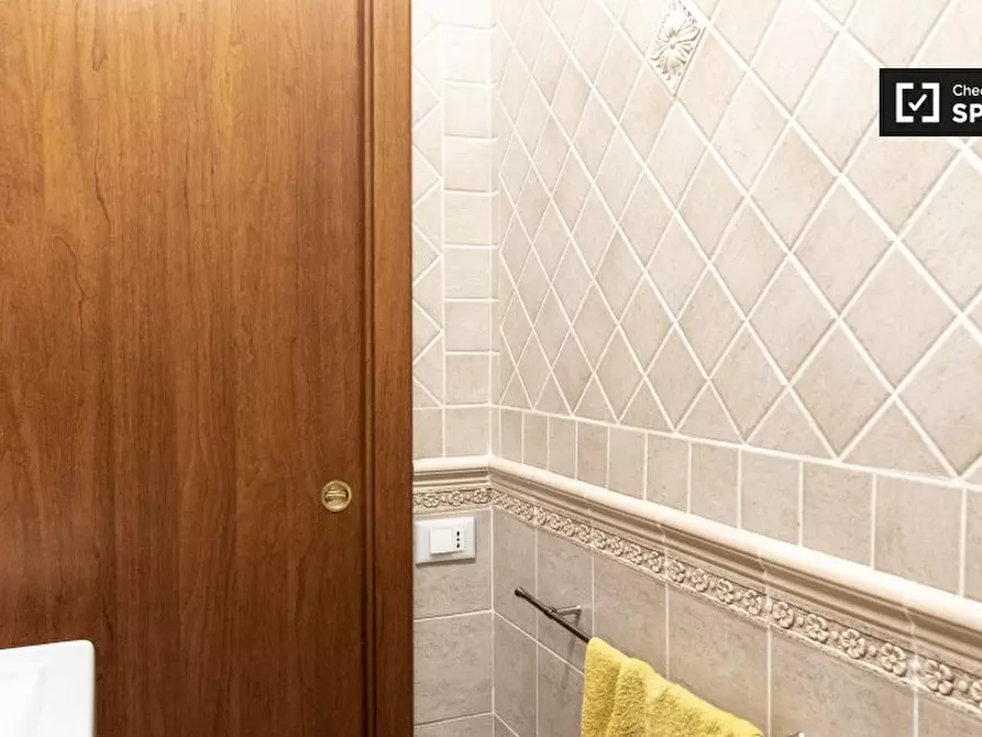 Immagine 9 di Camera condivisa in affitto  in Via Palestro a Roma