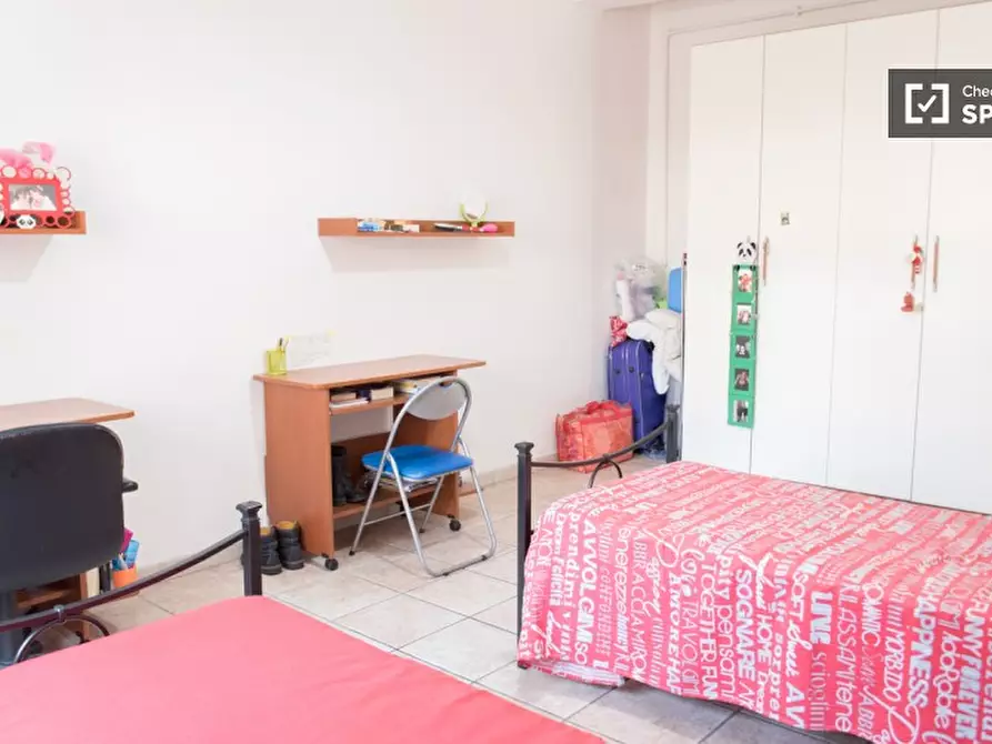 Immagine 11 di Camera condivisa in affitto  in Via Ostiense a Roma