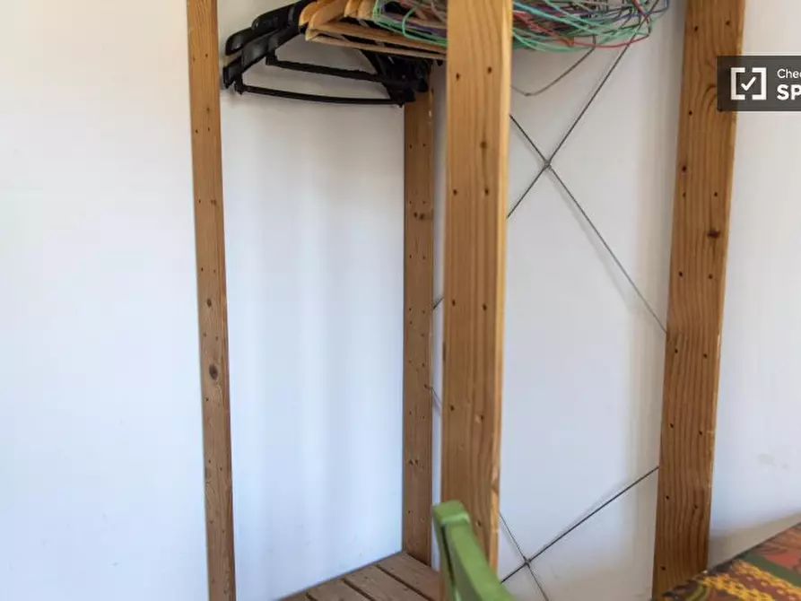 Immagine 4 di Camera condivisa in affitto  in Via Pesaro a Roma