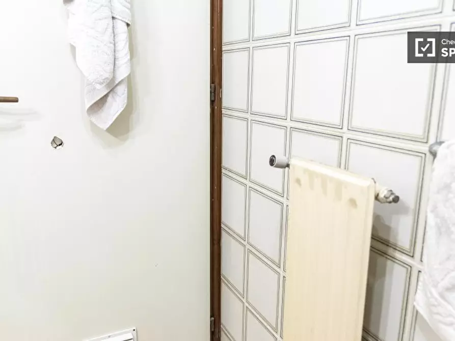 Immagine 17 di Camera condivisa in affitto  in Via Clemente Rebora a Roma