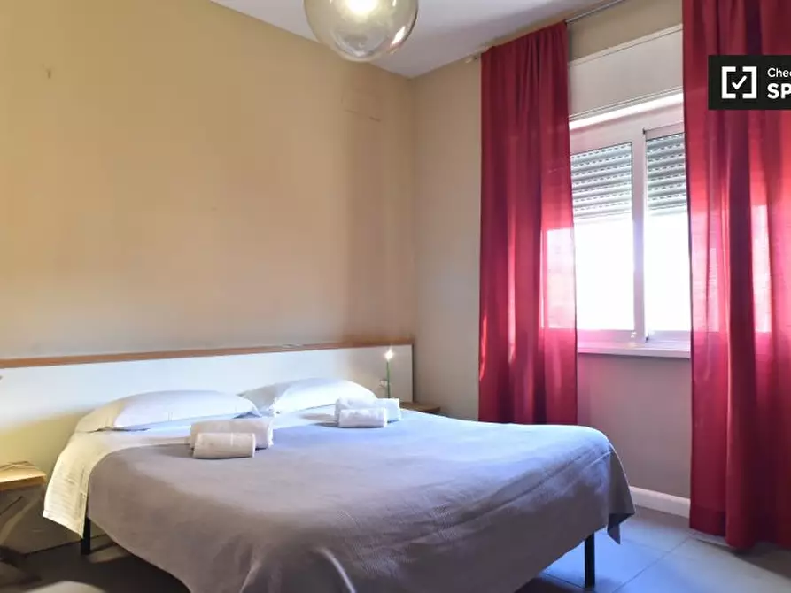 Immagine 4 di Camera condivisa in affitto  in Viale Opita Oppio, 00174 Roma RM, Italy a Roma