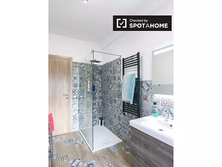 Immagine 19 di Camera condivisa in affitto  in Viale Giustiniano Imperatore a Roma