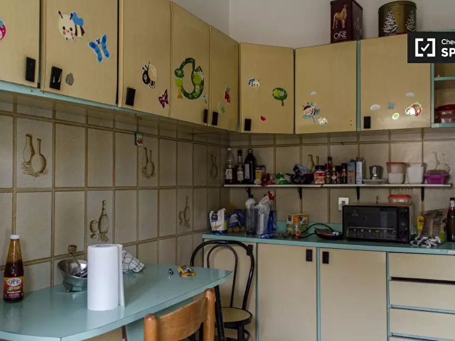 Immagine 11 di Camera condivisa in affitto  in Via Ozanam a Roma