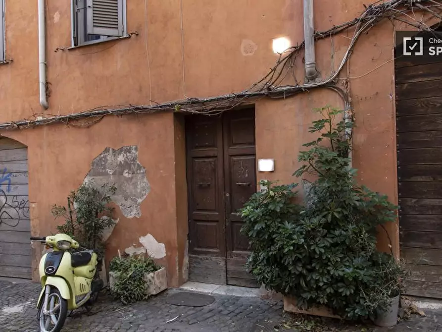 Immagine 18 di Camera condivisa in affitto  in Via in Selci a Roma