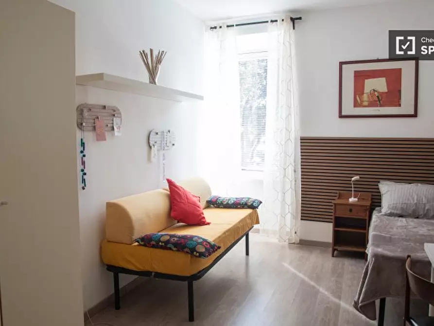 Immagine 18 di Camera condivisa in affitto  in Via Ostiense a Roma