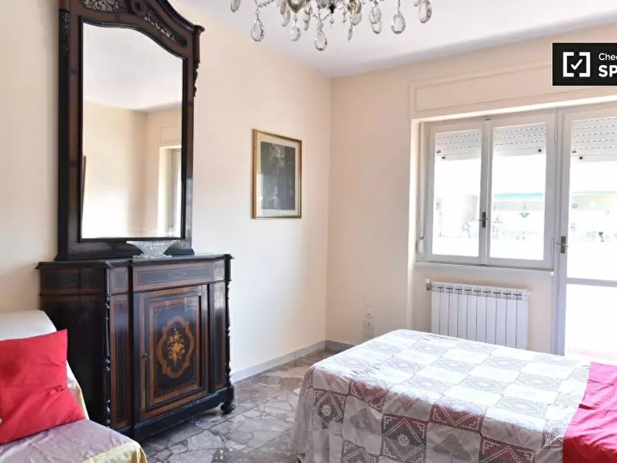 Immagine 3 di Camera condivisa in affitto  in Via Sandro Sandri a Roma