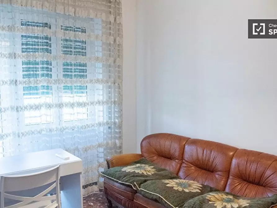 Immagine 15 di Camera condivisa in affitto  in Via Orbassano a Roma