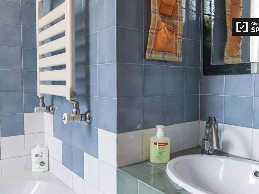 Immagine 8 di Camera condivisa in affitto  in Via Corinto a Roma