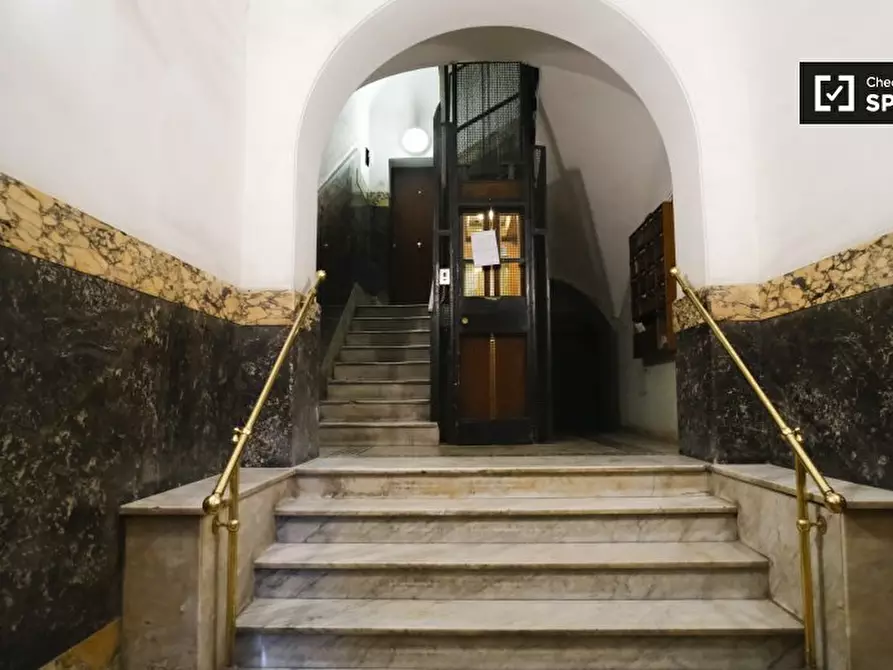 Immagine 15 di Camera condivisa in affitto  in Via Appia Nuova a Roma