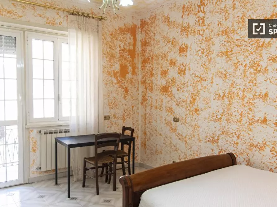 Immagine 19 di Camera condivisa in affitto  in Via Simone Ghini a Roma