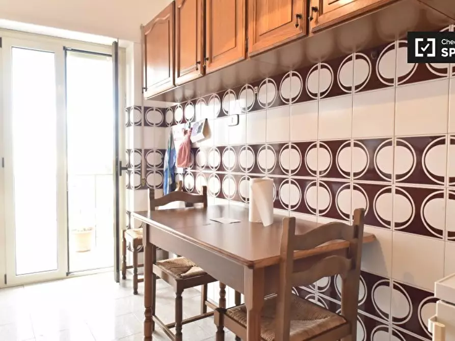 Immagine 6 di Camera condivisa in affitto  in Via Oderzo, 00182 Roma RM, Italy a Roma