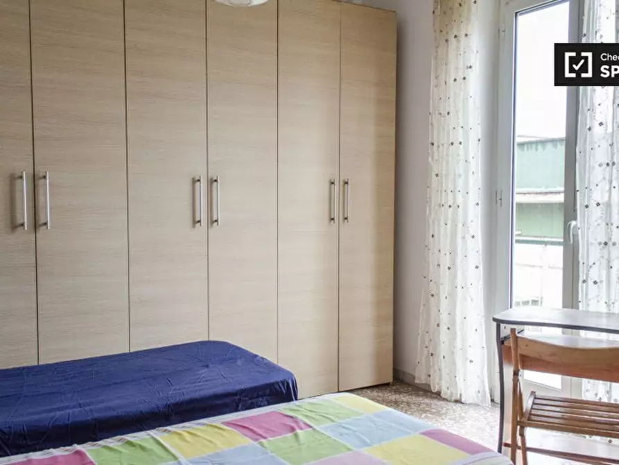 Immagine 3 di Camera condivisa in affitto  in Via Federico Ozanam a Roma