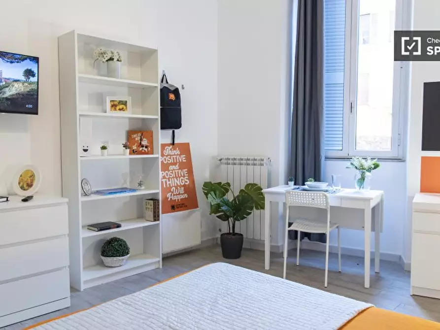 Immagine 5 di Camera condivisa in affitto  in Via in Selci a Roma