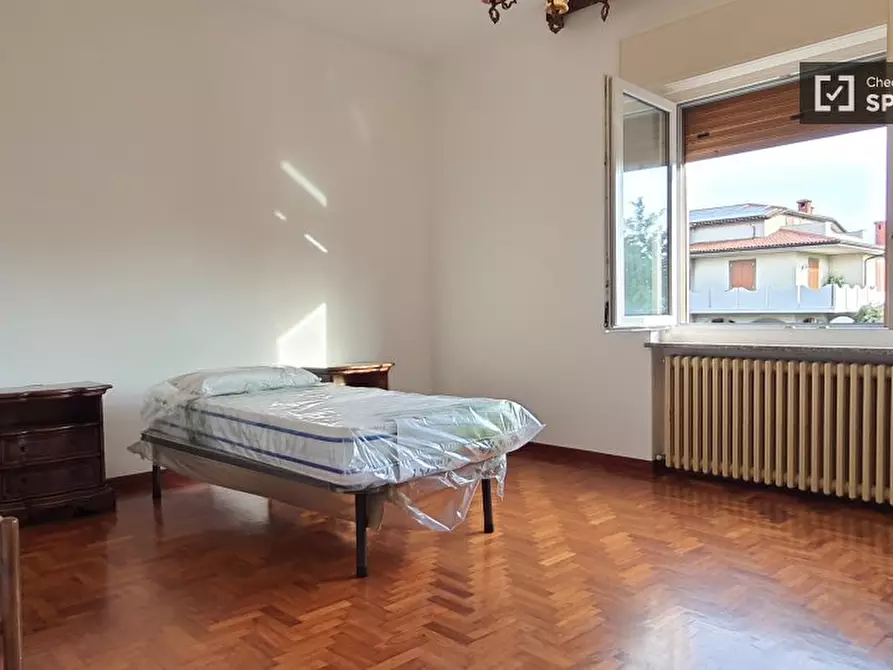 Immagine 1 di Camera condivisa in affitto  in Via G. Deledda a Treviolo