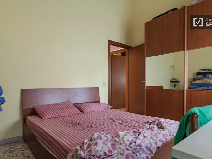 Immagine 2 di Camera condivisa in affitto  in Via Montefalco a Roma