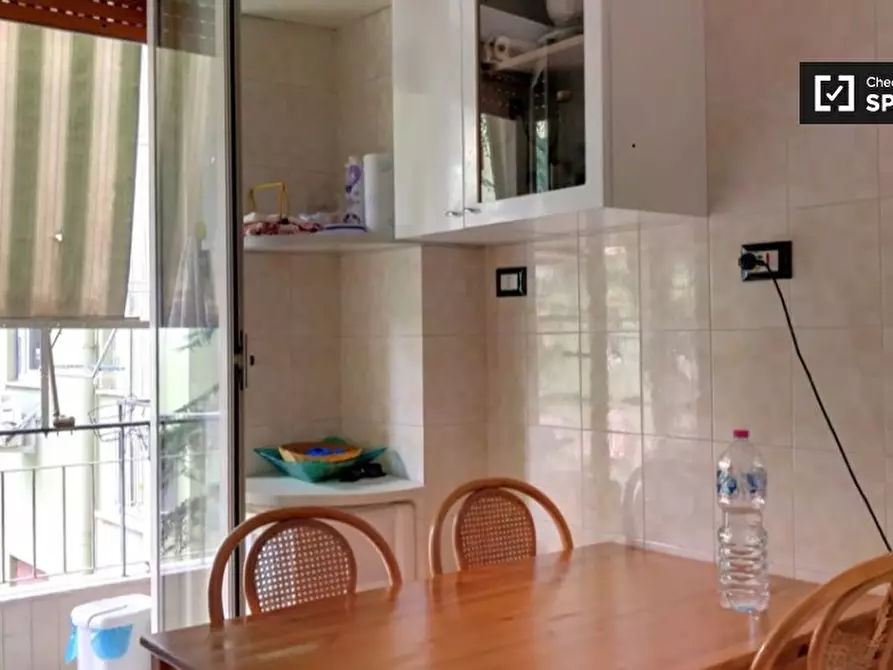 Immagine 7 di Camera condivisa in affitto  in Via Aquilonia, 00177 Roma RM, Italy a Roma