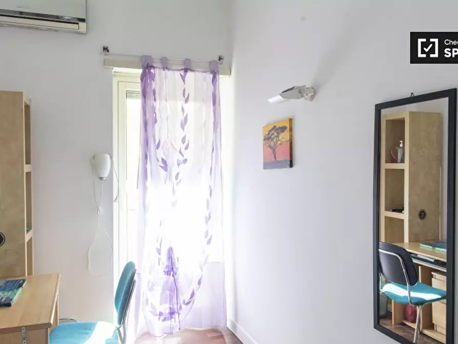 Immagine 4 di Camera condivisa in affitto  in Via Baldassarre Orero, 00159 Roma RM, Italy a Roma