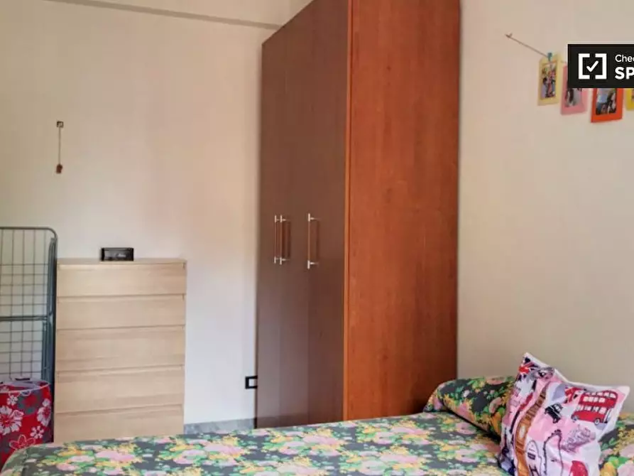 Immagine 2 di Camera condivisa in affitto  in Via Aquilonia, 00177 Roma RM, Italy a Roma