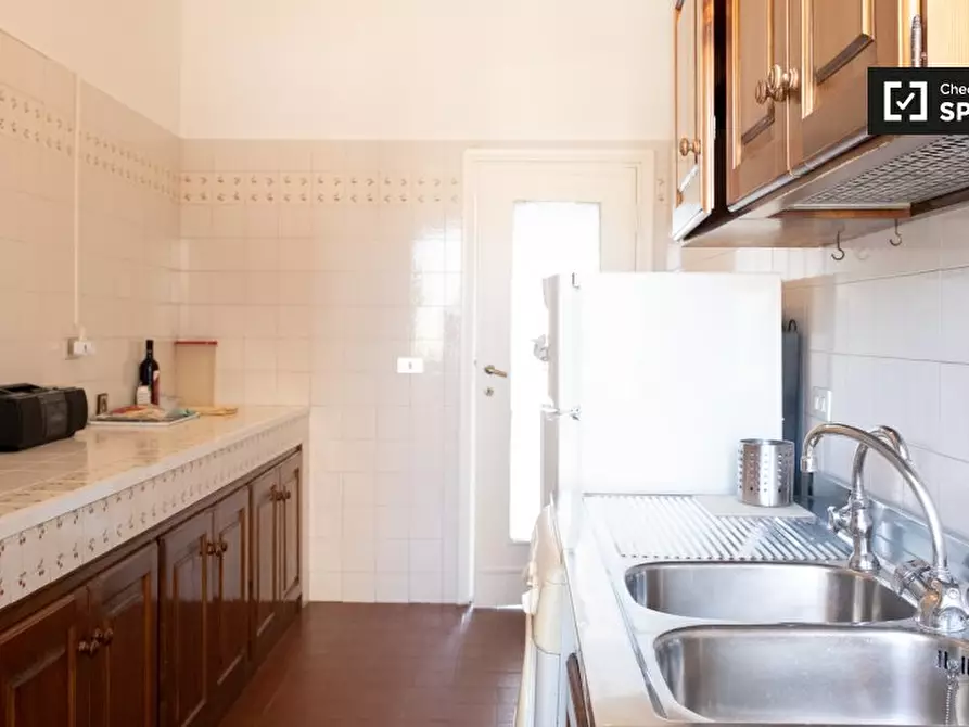 Immagine 10 di Camera condivisa in affitto  in Via Alfonso Borelli a Roma