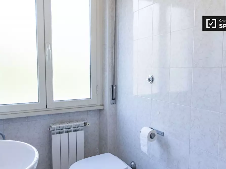 Immagine 8 di Camera condivisa in affitto  in Via Portuense a Roma