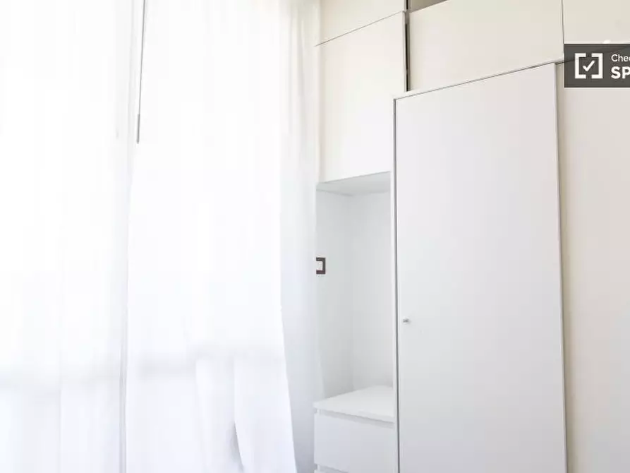 Immagine 2 di Camera condivisa in affitto  in Viale Eretum a Roma