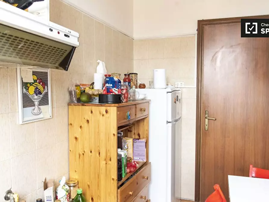 Immagine 14 di Camera condivisa in affitto  in Via Sinuessa a Roma