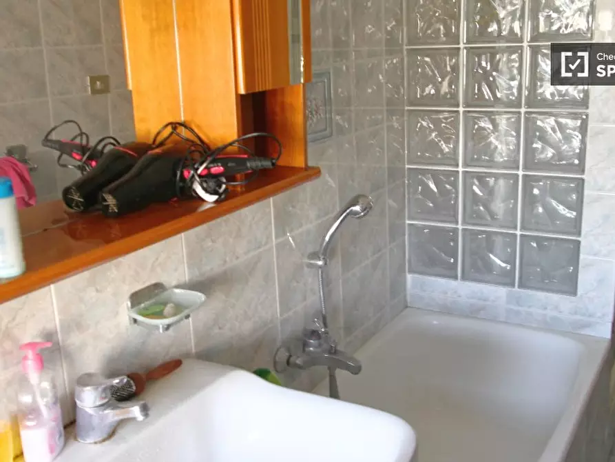 Immagine 12 di Camera condivisa in affitto  in Via Oderzo a Roma