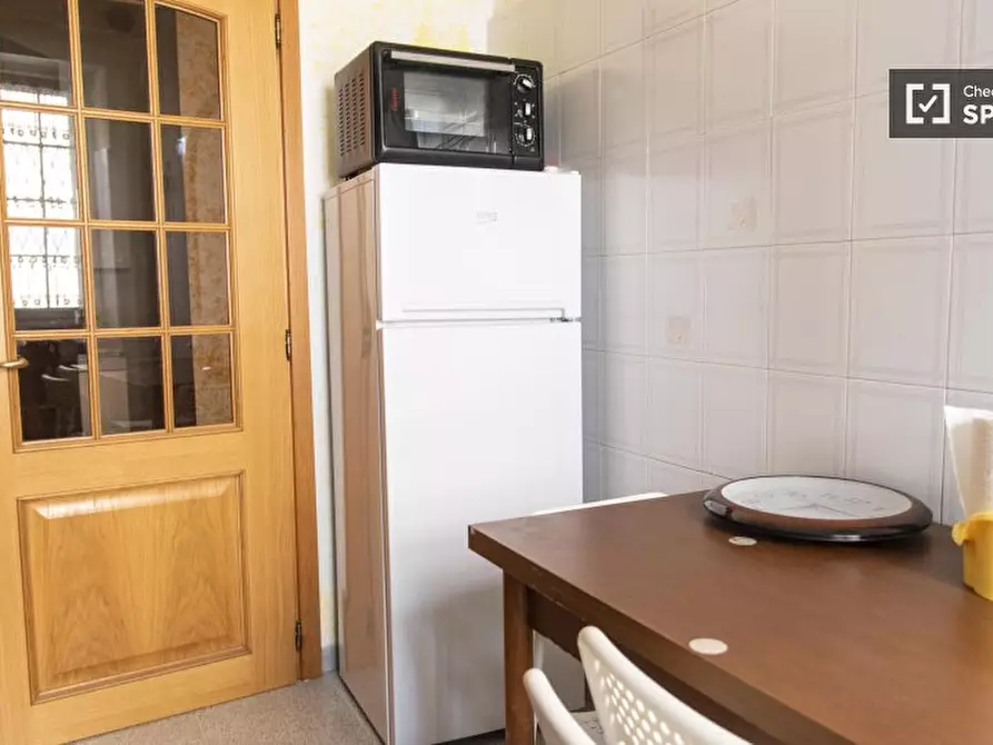 Immagine 12 di Camera condivisa in affitto  in Via Simone Ghini a Roma