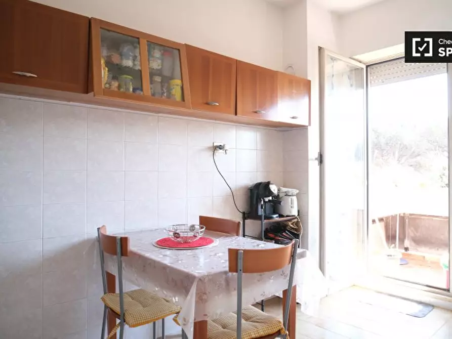 Immagine 11 di Camera condivisa in affitto  in Viale dei Caduti Nella Guerra di Liberazione, 00128 Roma RM, Italy a Roma