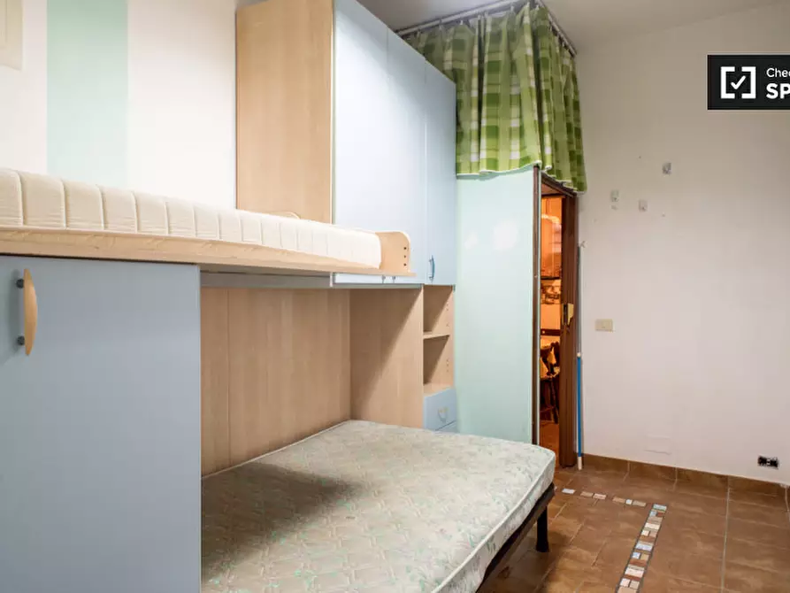 Immagine 2 di Camera condivisa in affitto  in Via degli Equi a Roma