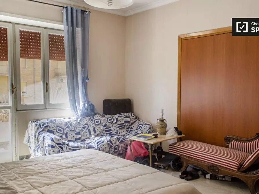 Immagine 3 di Camera condivisa in affitto  in Via Val d'Ossola, 00141 Roma RM, Italy a Roma