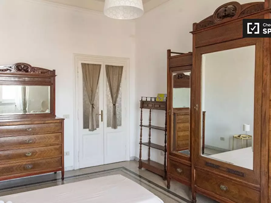 Immagine 10 di Camera condivisa in affitto  in Via Catania, 00161 Roma RM, Italy a Roma