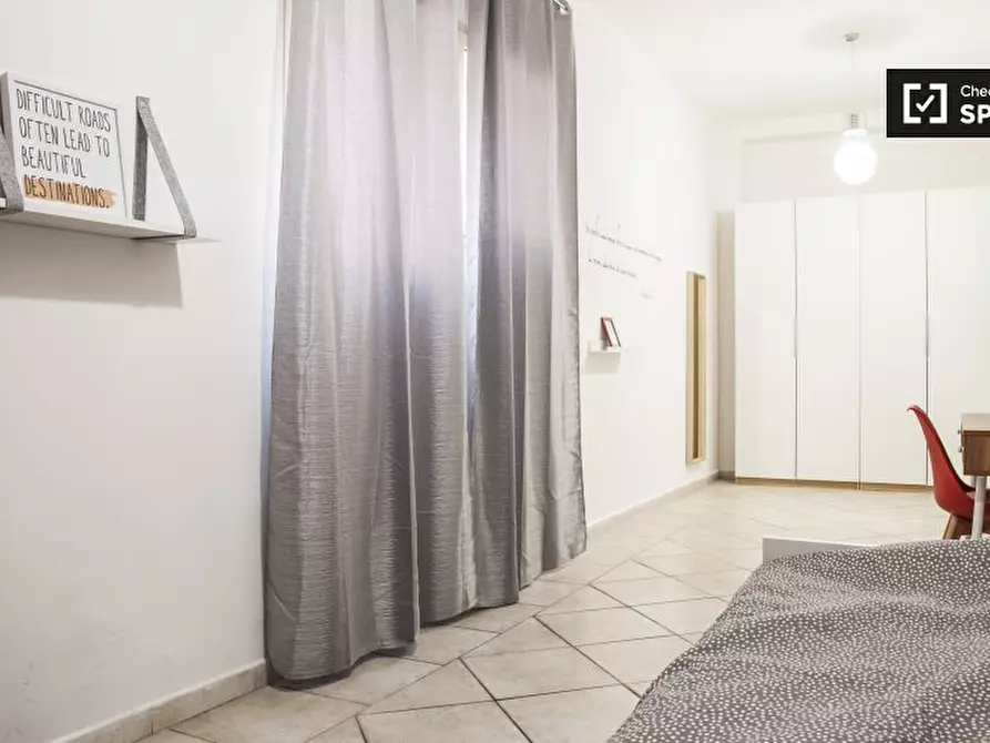 Immagine 13 di Camera condivisa in affitto  in Via Raddusa a Roma