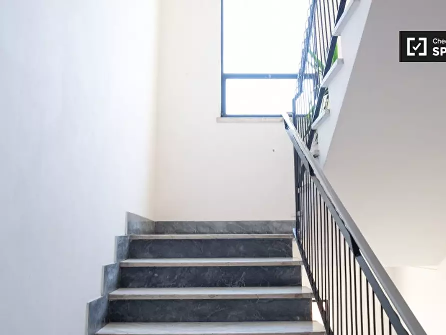 Immagine 19 di Camera condivisa in affitto  in Via Pietro D'Assisi a Roma