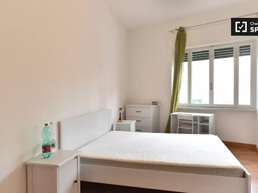 Immagine 16 di Camera condivisa in affitto  in Via Lorenzo Valla a Roma