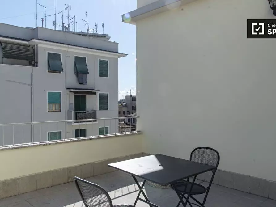 Immagine 15 di Camera condivisa in affitto  in Via Portuense a Roma