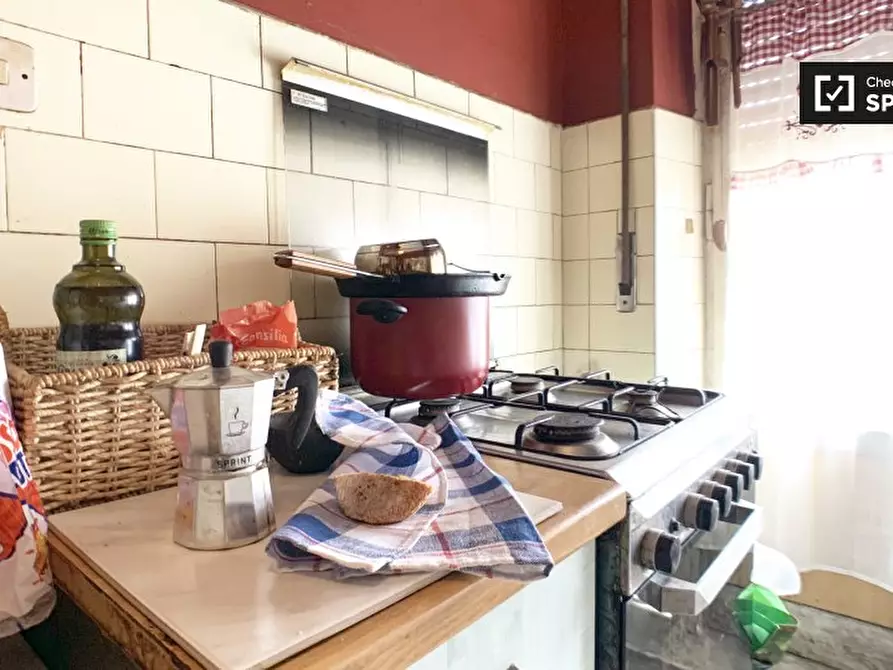 Immagine 7 di Camera condivisa in affitto  in Via Simone Mosca, 00168 Roma RM, Italy a Roma