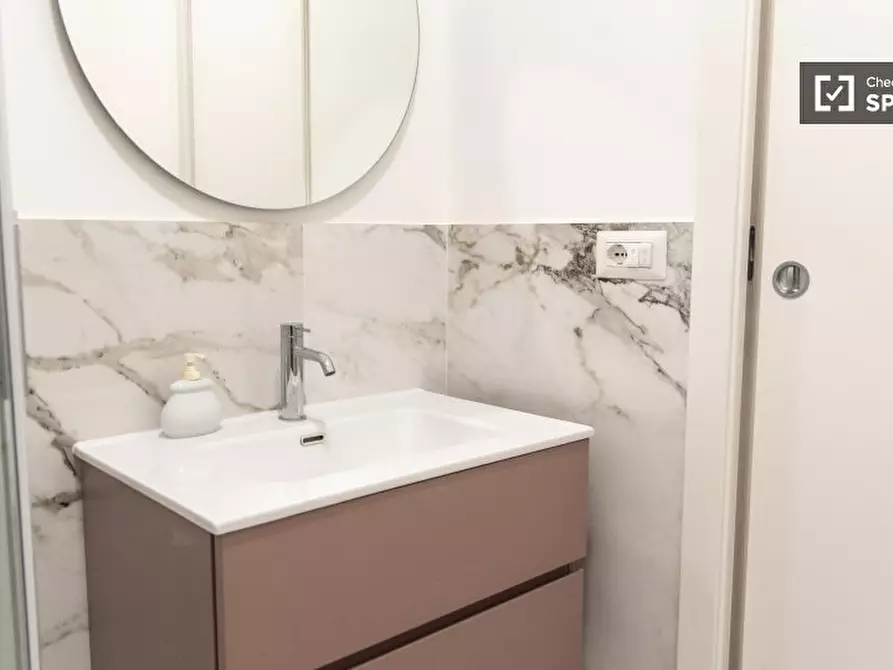 Immagine 10 di Camera condivisa in affitto  in Via Ottorino Lazzarini a Roma