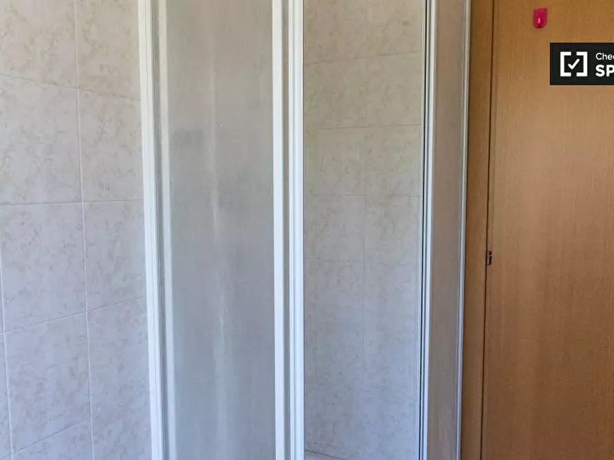 Immagine 11 di Camera condivisa in affitto  in Via Portuense a Roma