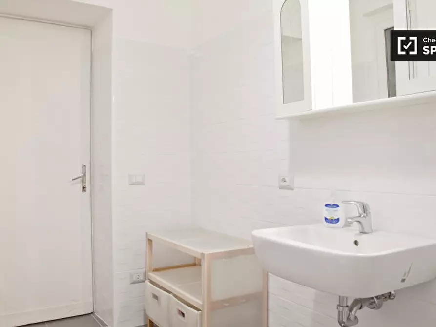 Immagine 19 di Camera condivisa in affitto  in Via della Ferratella in Laterano a Roma