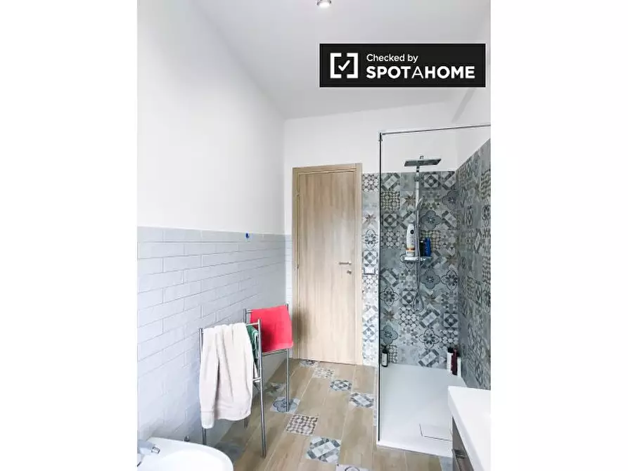 Immagine 18 di Camera condivisa in affitto  in Viale Giustiniano Imperatore a Roma