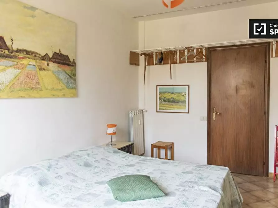 Immagine 4 di Camera condivisa in affitto  in Via Sinuessa a Roma