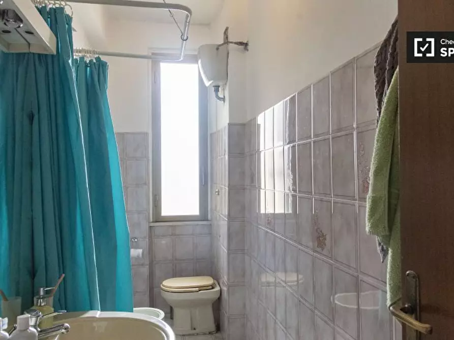 Immagine 7 di Camera condivisa in affitto  in Via Sinuessa a Roma
