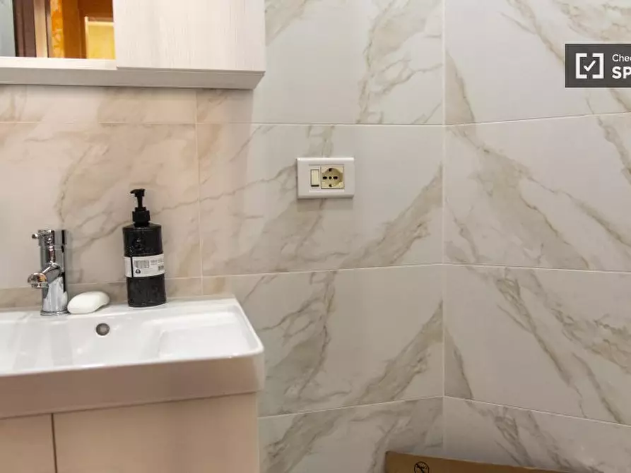 Immagine 13 di Camera condivisa in affitto  in Via Simone Ghini a Roma