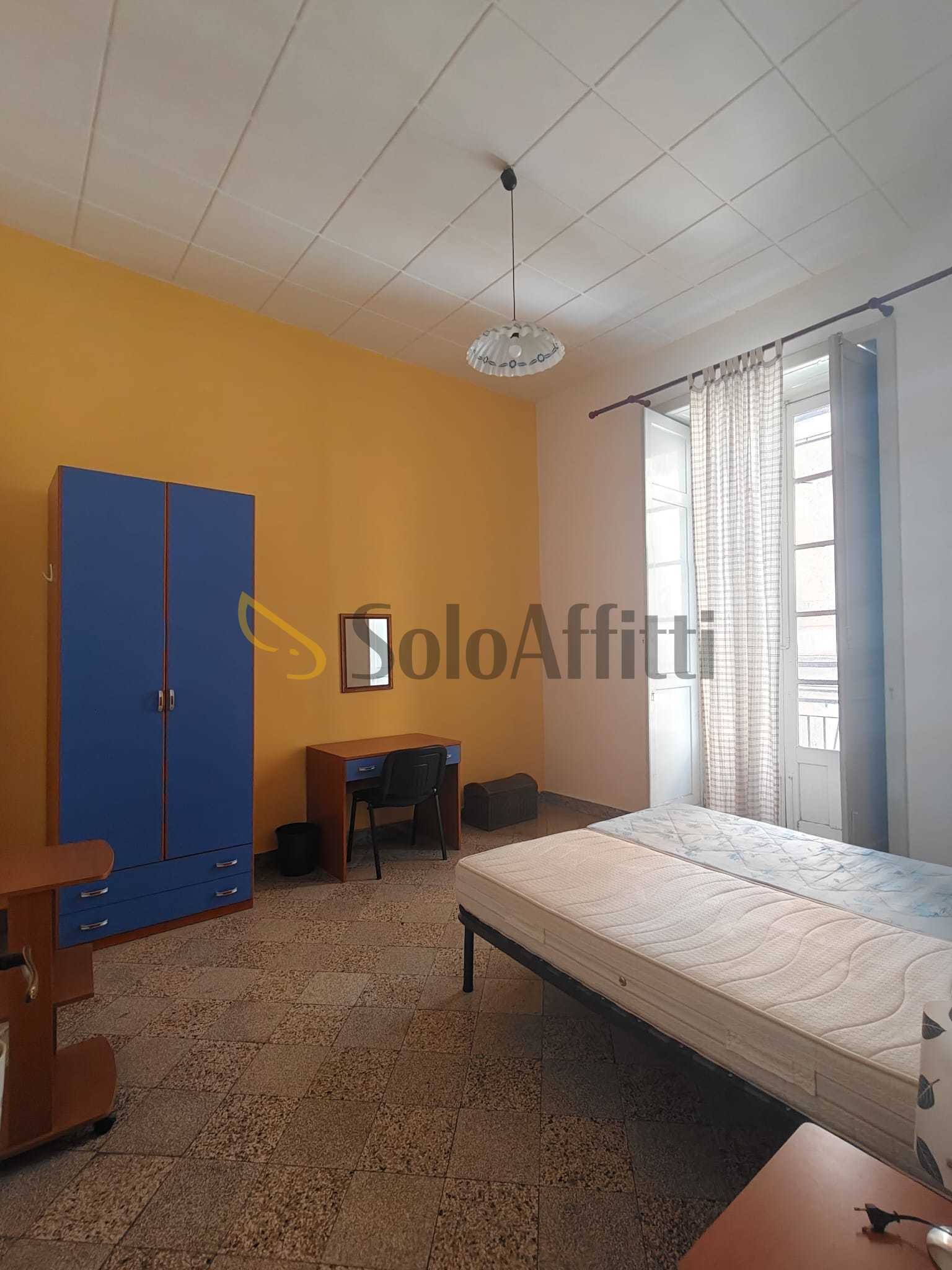 Immagine 12 di Stanza singola in affitto  a Catania